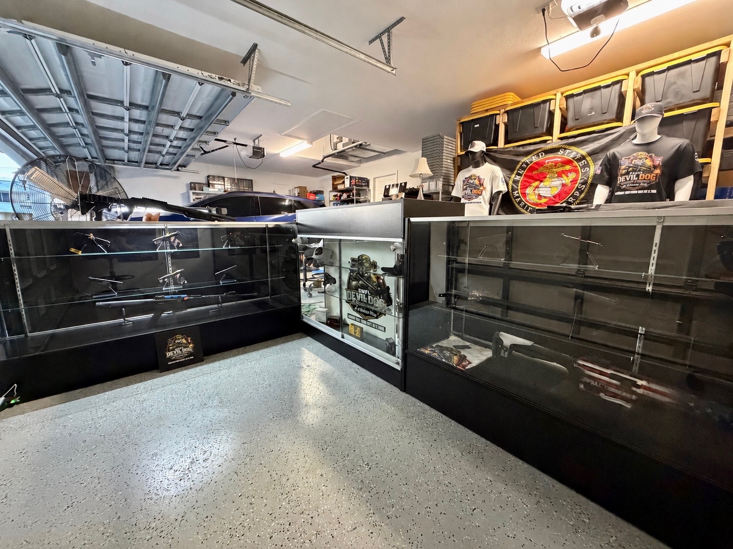 Showroom interior with display cases and apparel