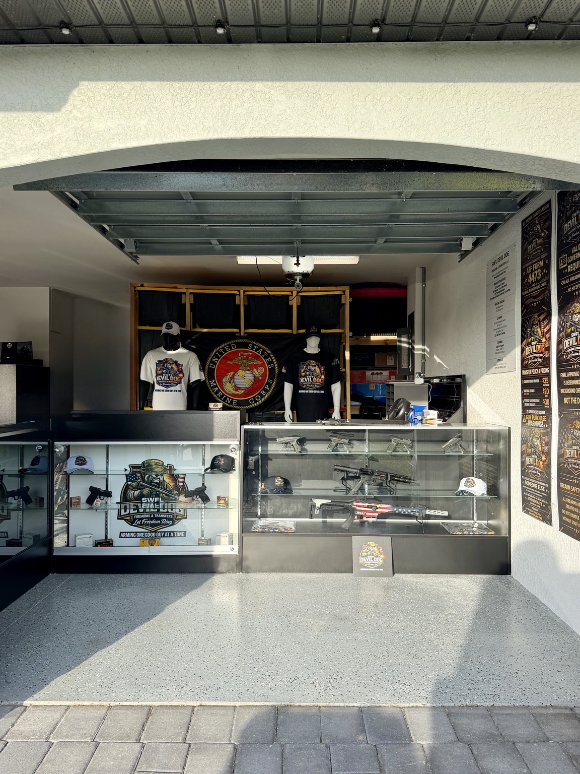 SWFL Devil Dog Firearms front counter, display cases, and Marine Corps branding